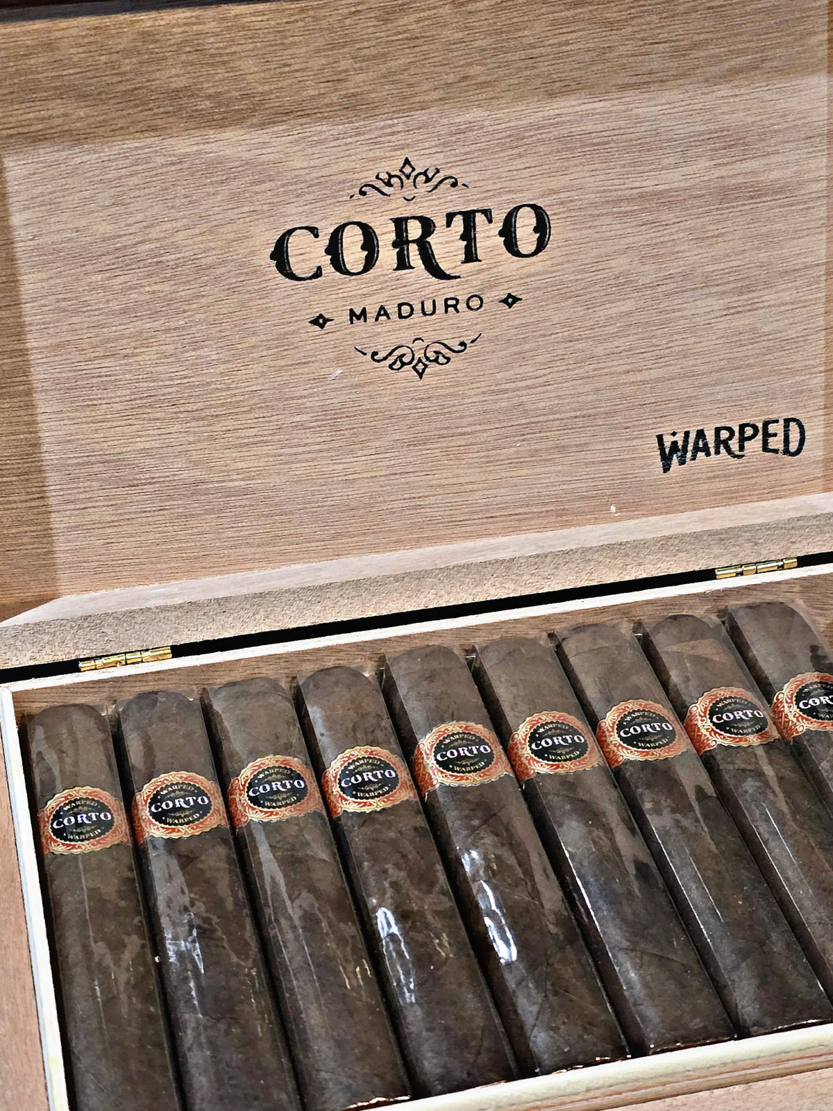 Warped Corto x46 Maduro Petite Corona